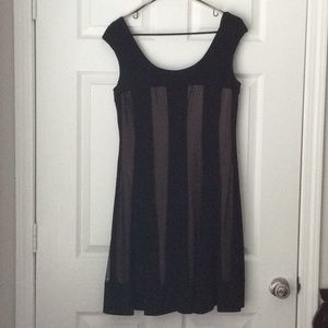 Dual layers beige under lay black solid/shear top